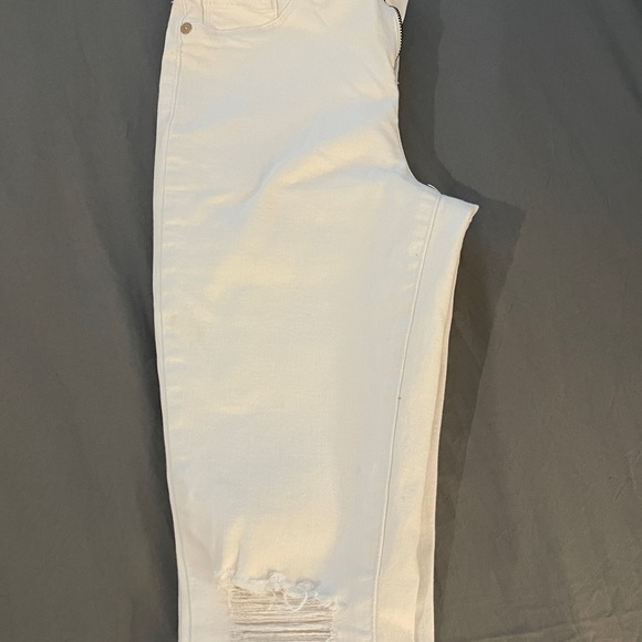 White skinny jeans with stretch and slightly distressed.  Never been worn. 27 - Picture 3 of 10